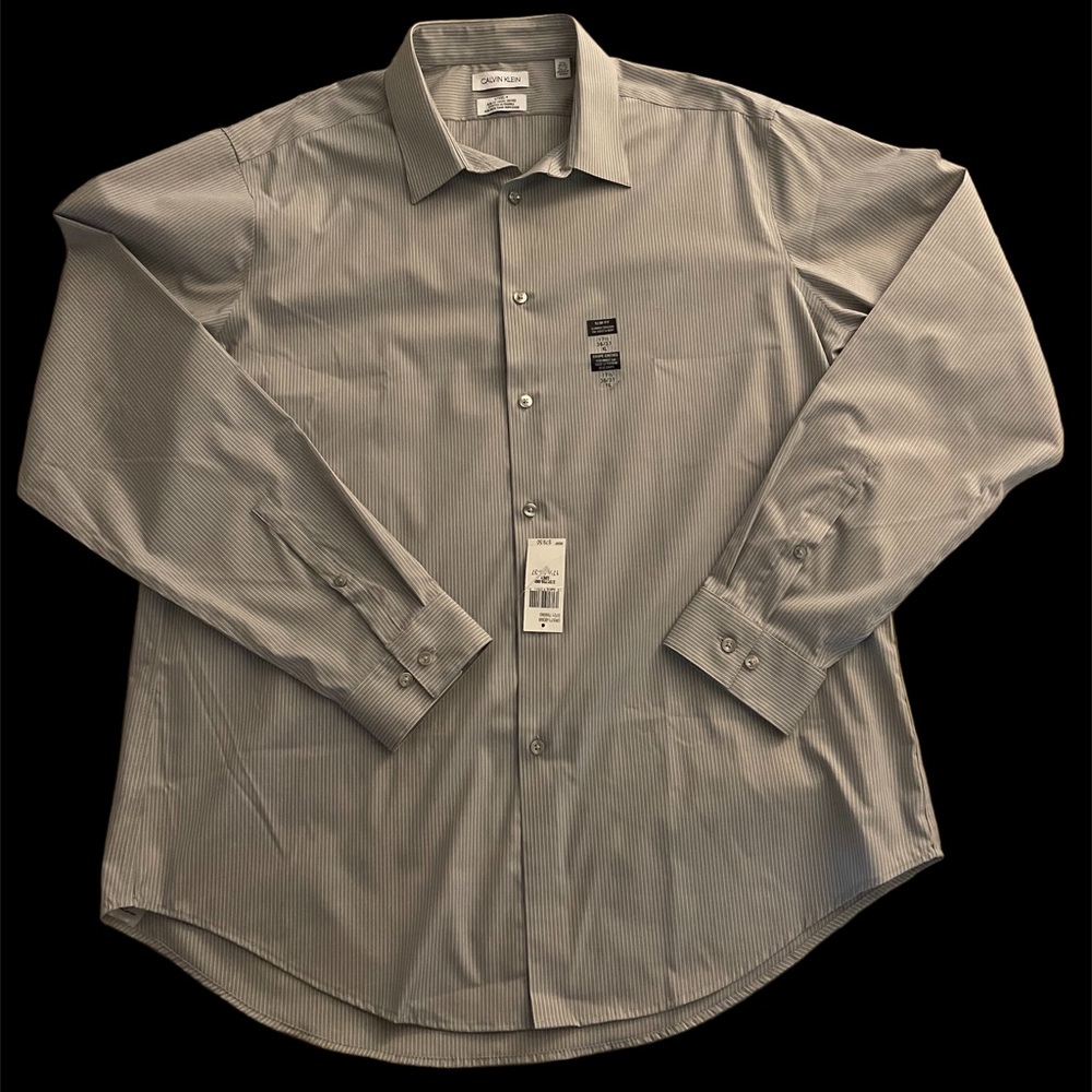 NWT Calvin Klein, size X large, long sleeves, slim fit,